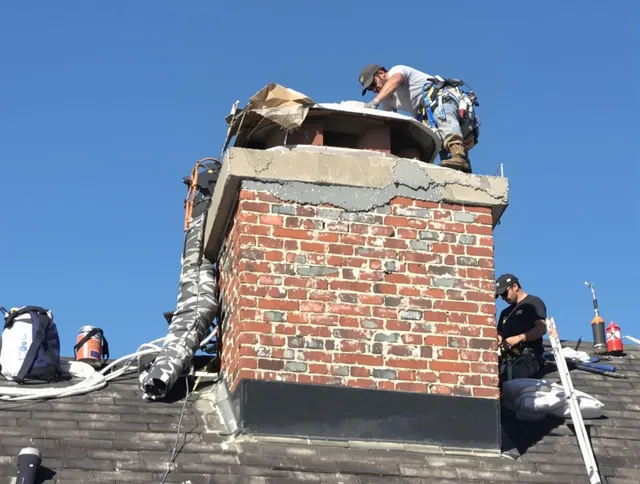 Sarasota Chimney Sweep installing a custom chimney crown in Sarasota, FL