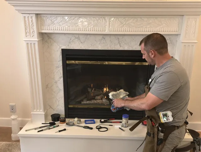 Sarasota Chimney Sweep performing fireplace maintenance in Sarasota, FL